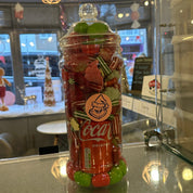 Red and drink Grinch Christmas theme sweet jar with coca-cola drink